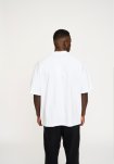 T-shirt m. print "dev" | 100% bomuld | Hvid -Resteröds