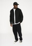 Overshirt "leo" | 100% polyester | Sort -Resteröds