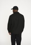 Overshirt "leo" | 100% polyester | Sort -Resteröds